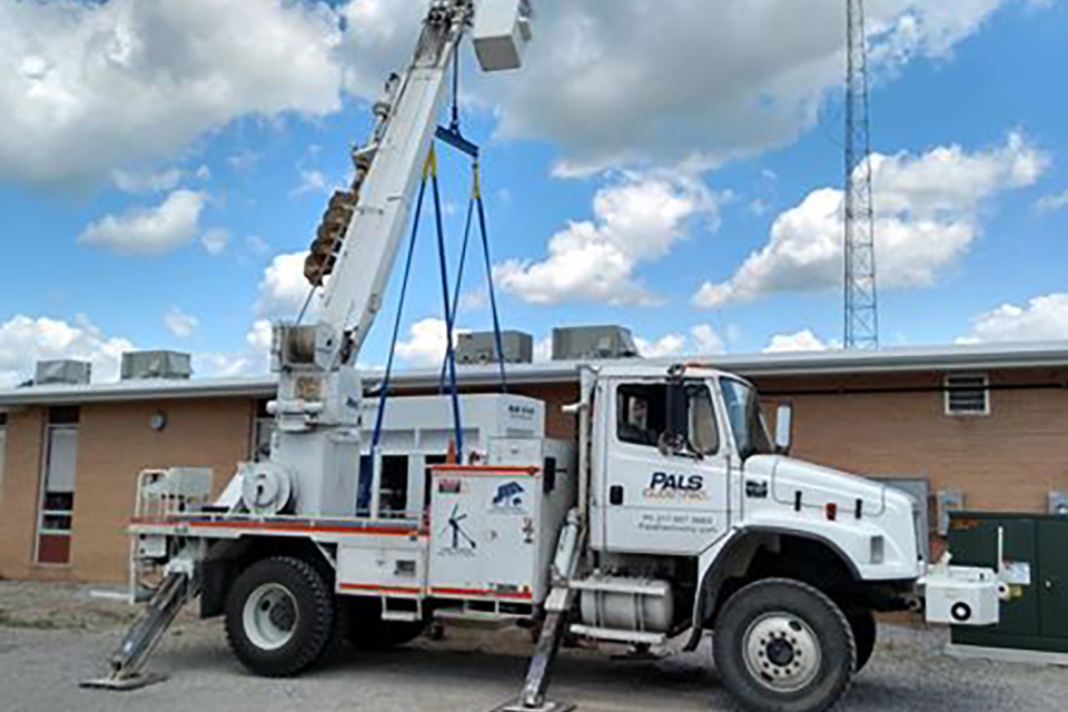 Pals Electric bucket truck at work