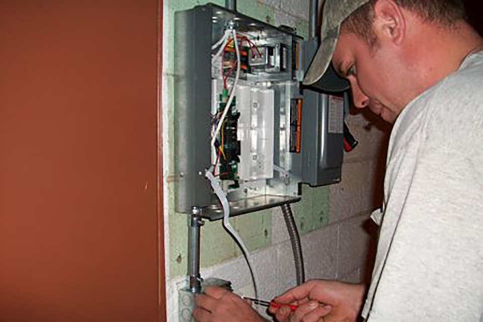 Pals Electric electrician working on temperature controls
