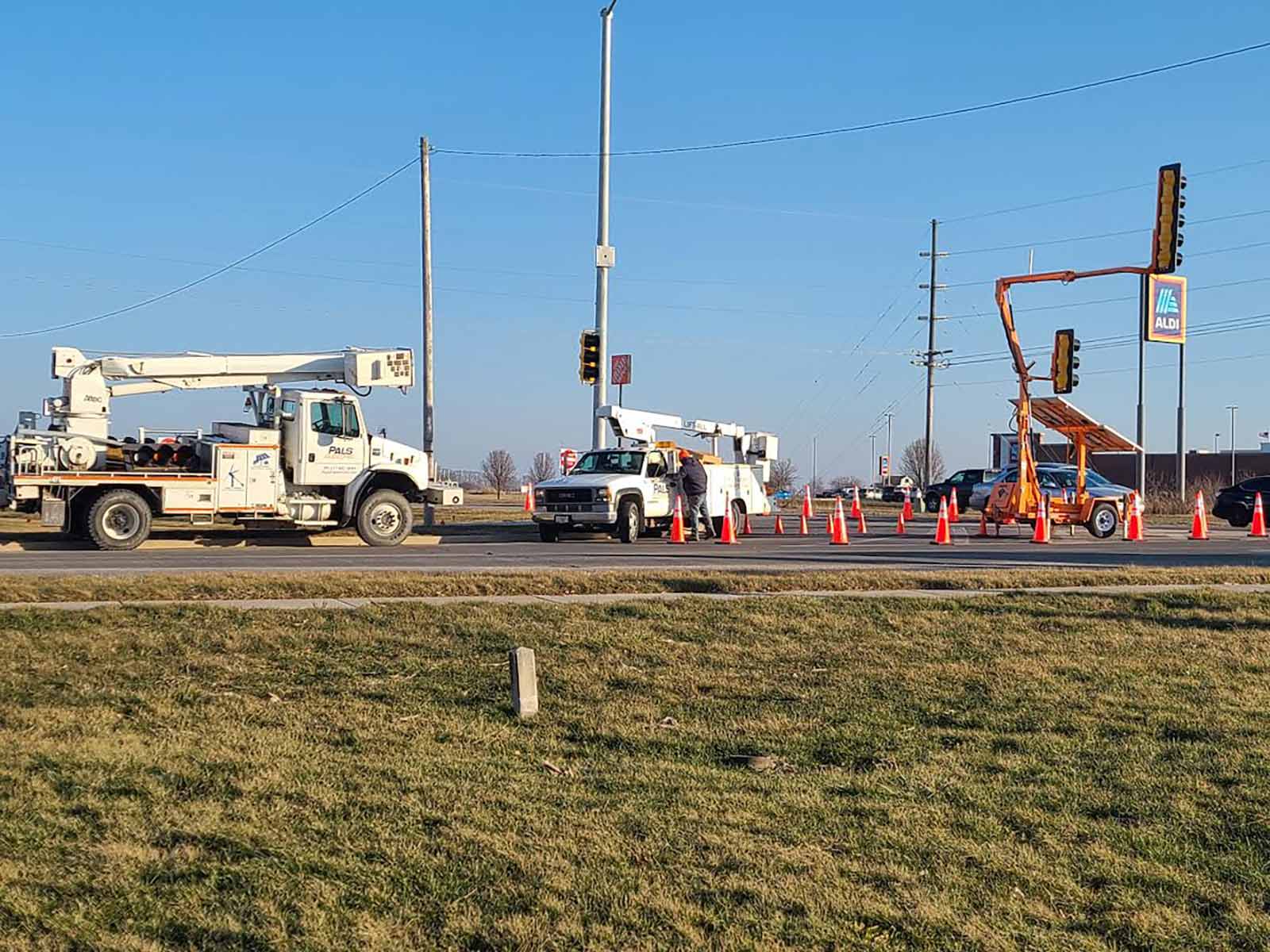 Pals electricians working on traffic lights