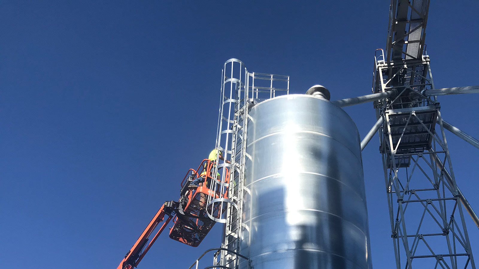 Pal's Electric electrician working on a bulk bin