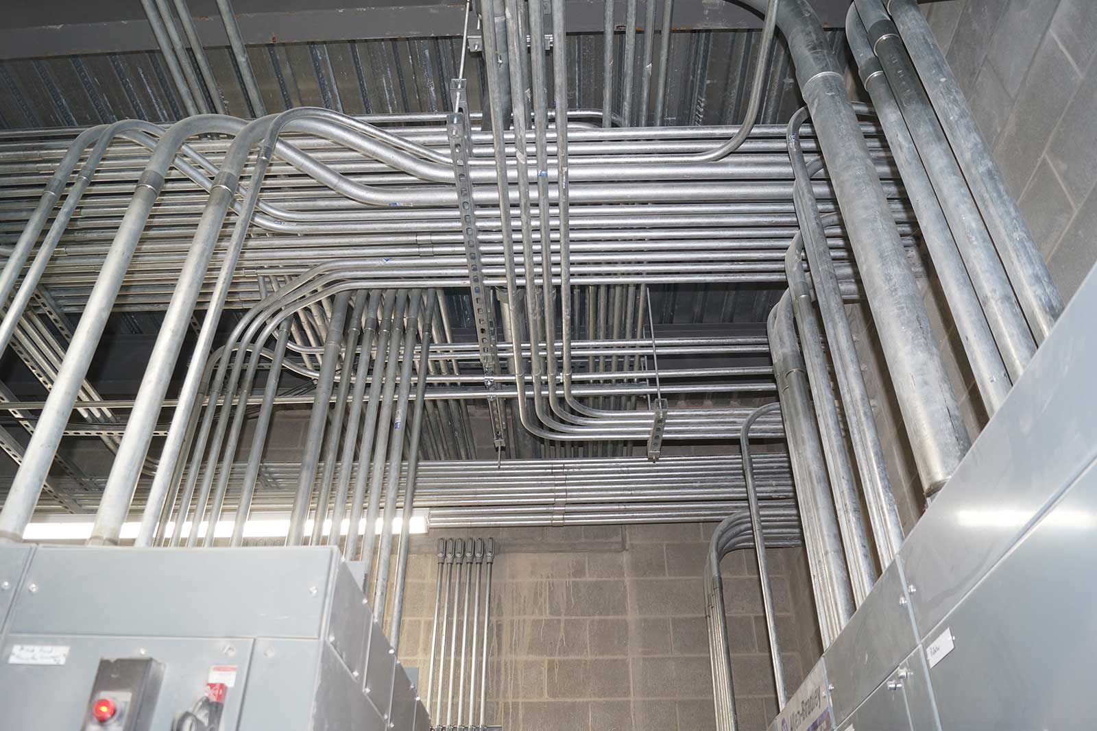 conduit in ceiling of a room inside an Effingham feed mill